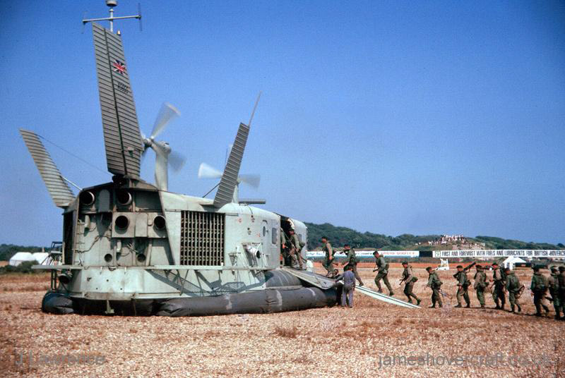 The SRN3 with the Inter-Service Hovercraft Trials Unit, IHTU - Troops lining up to get on-board (submitted by Pat Lawrence).